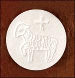 Embossed with lamb and cross symbols